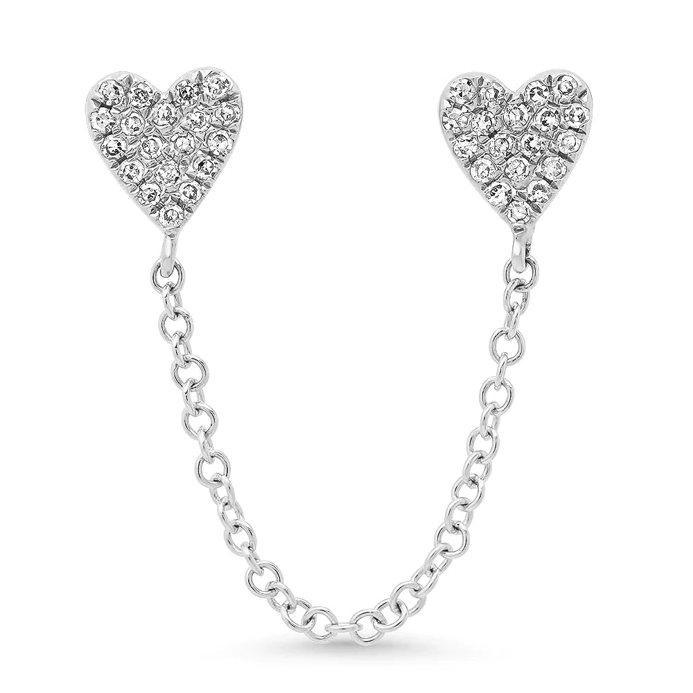Doble arete tipo piercing de corazones en plata 925 con baño en oro blanco y circonias
