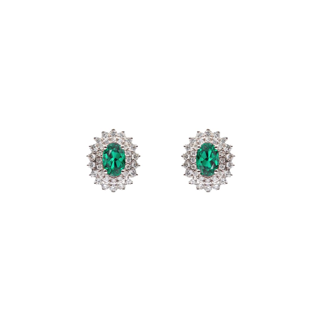 Studs con esmeraldas y halo de diamantes