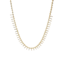 Tennis con dangling baguettes de circonia