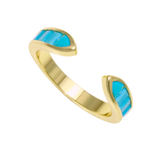 Anillo claw con baguettes de circonia