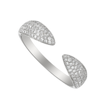 Anillo claw con diamantes en paveé