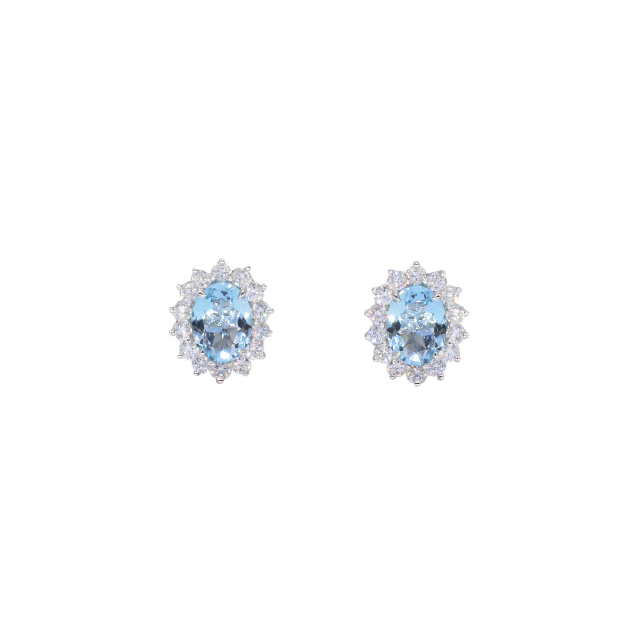 Studs con aguamarinas y halo de diamantes