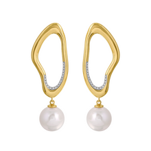 Statement earrings con perlas y diamantes