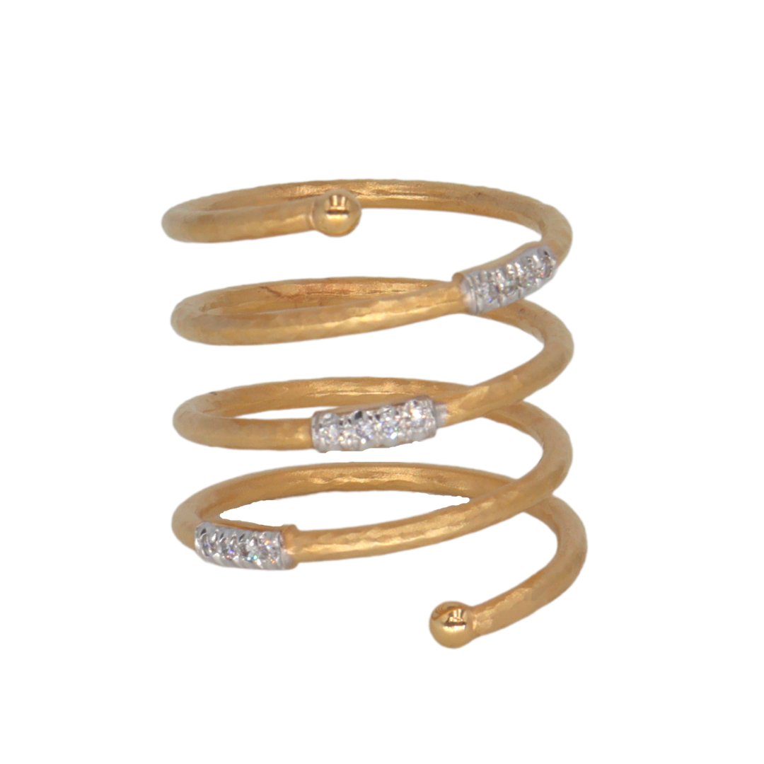 Anillo espiral en oro amarillo 14k con diamantes 0.12CTD