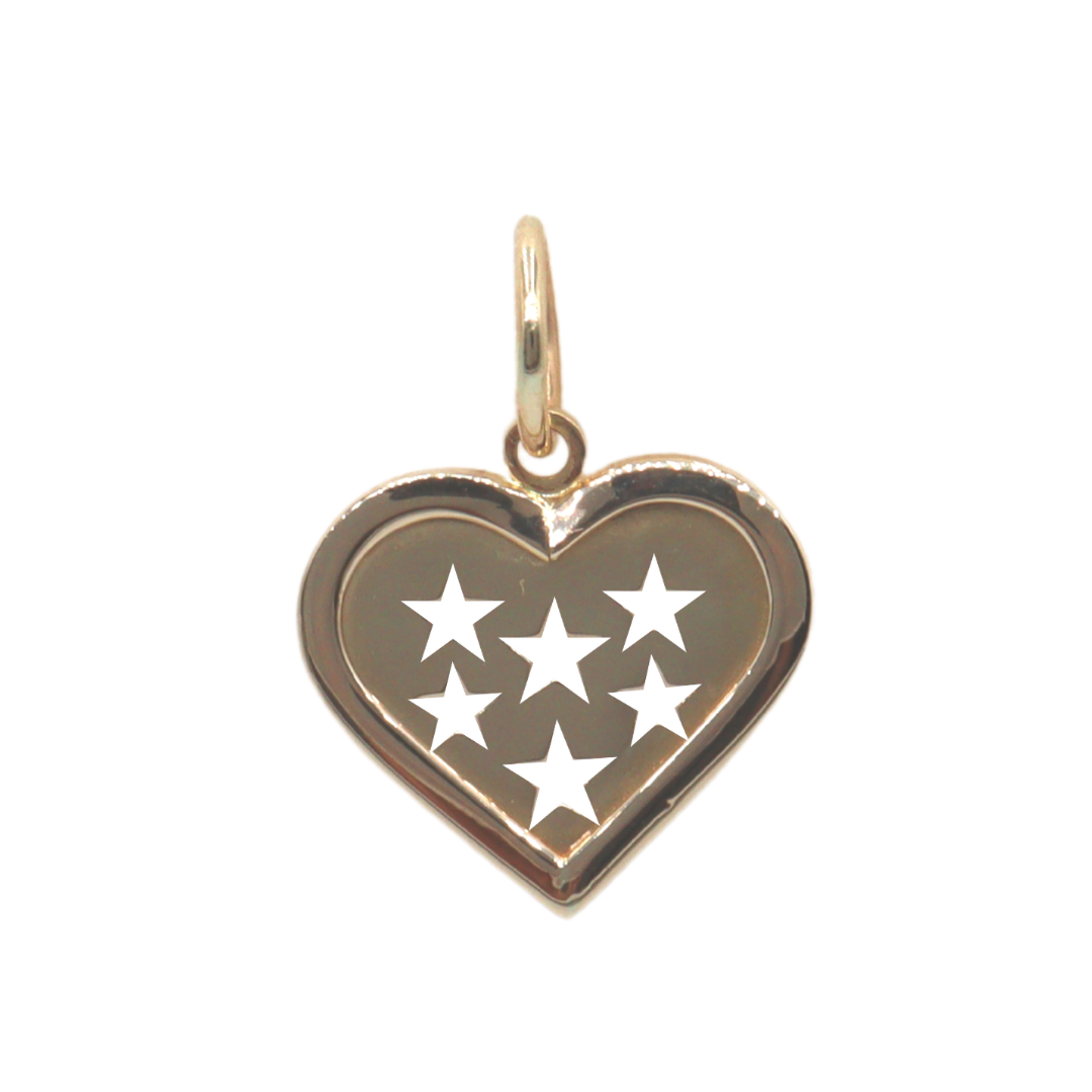 Dije de oro amarillo 14k en forma de corazón con estrellas