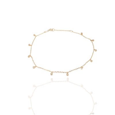 Tobillera con multidijes de circonias en oro amarillo 14k